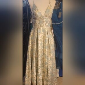 Cream and Blue Sleeveless Prom Gown with Plunge Neckline